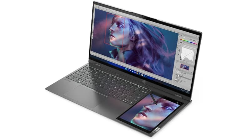 A three-quarter view of an open laptop with a screen to the the keyboard