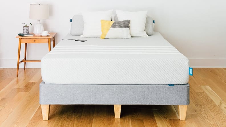 a leesa mattress on a gray bed frame