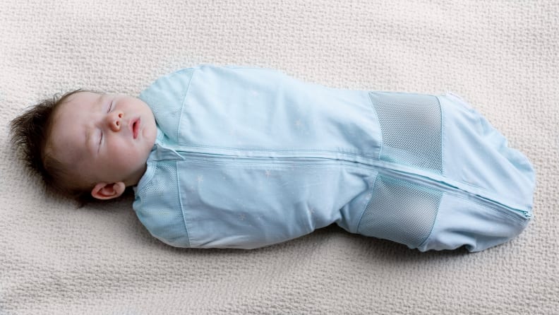 Baby wrapped in a Sleepea swaddle