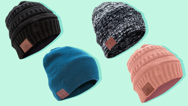 Four colorful beanies against a green background.