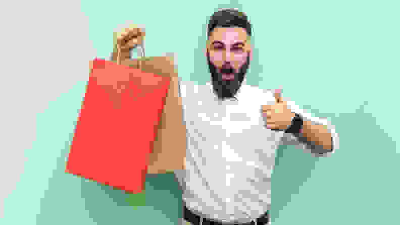 Happy man with shopping bags