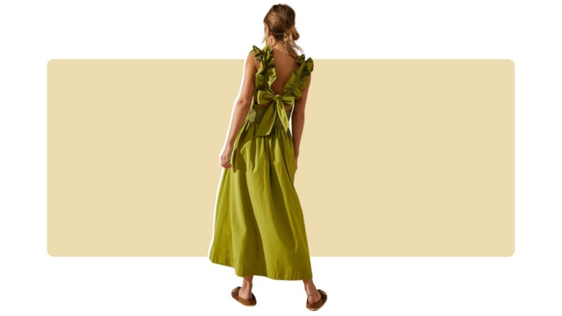 A muted lime casual dress with ruffles along the bodice and a bow-tie on the back.
