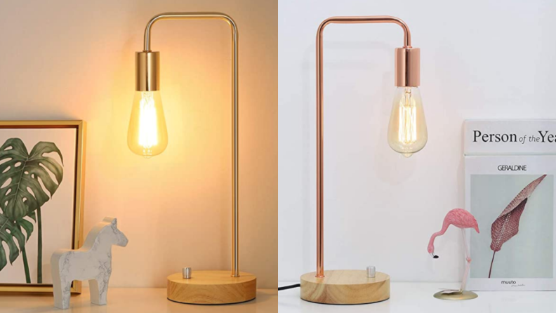 A metal lamp with a long lightbulb.