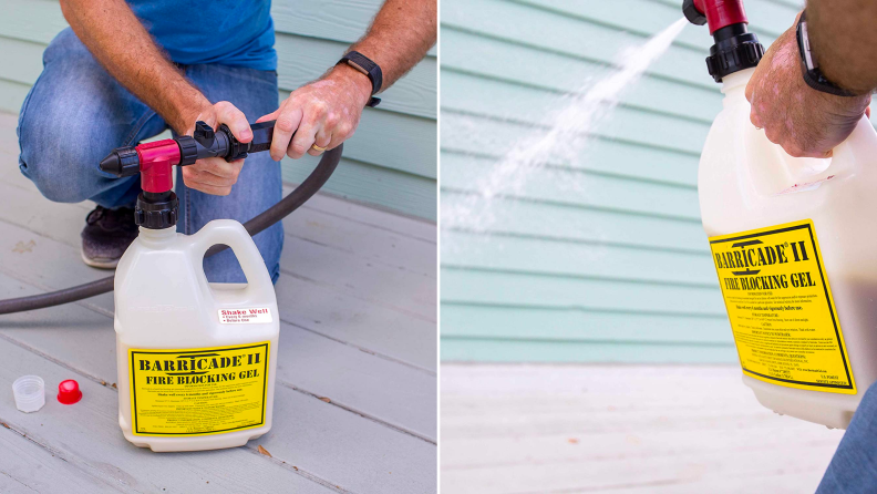 A person sprays fire resistant liquid onto the side of their home.