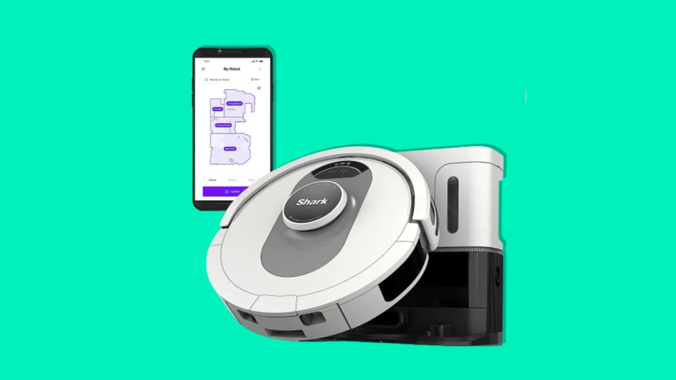 A Shark AI robot vacuum with its app on a green background.