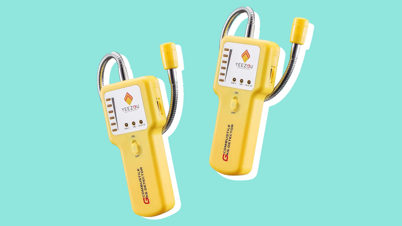 Two natural gas detectors against a blue background.