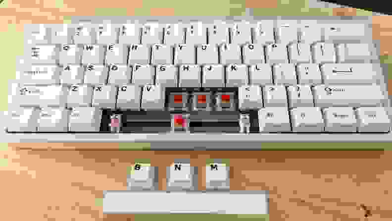 The CyberPowerPC K60 Keyboard with the space bar and the B N M switches taken out.