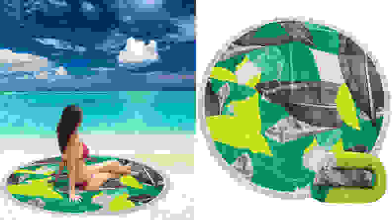 Person on the beach sitting on round towel.