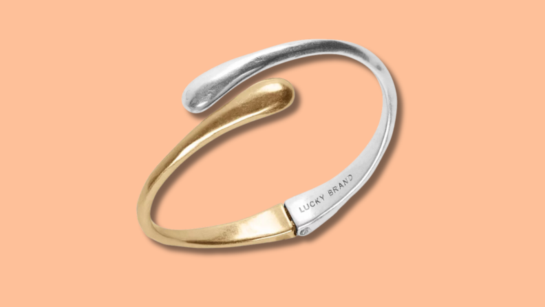 The Lucky Brand Two-Tone Bypass Bracelet is a timeless piece of jewelry in gold and silver.