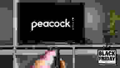 A TV shows the Peacock streaming service logo.