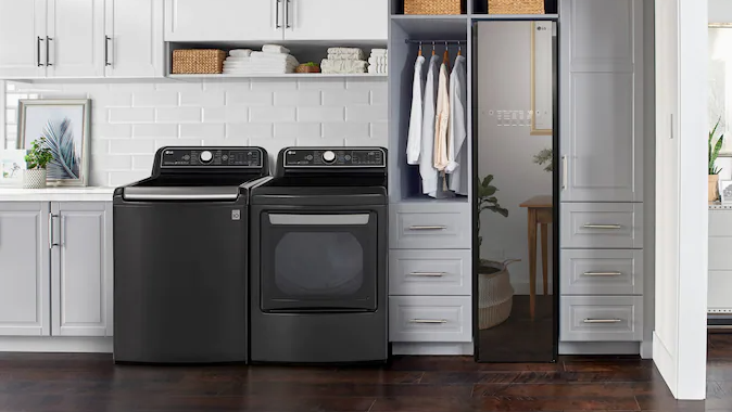 A washer and dryer unit in a laundry room.