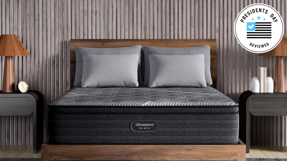 A Beautyrest Black mattress in a bedroom with the Presidents Day Reviewed badge.