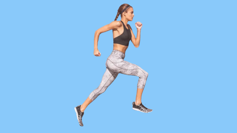 Photo of a woman in a running pose wearing a workout set from Lululemon against a blue background.