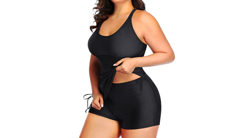 An image of a black tankini swimsuit with a pair of boy short swim bottoms.