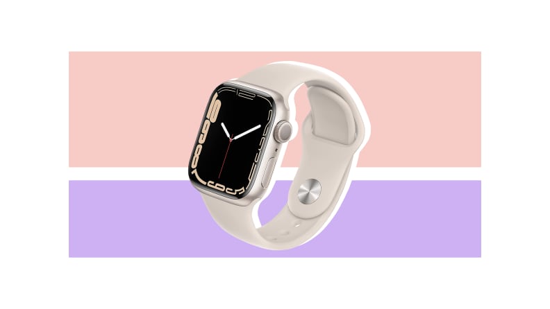 A white Apple Watch Series 8 against a pink and purple backgound.
