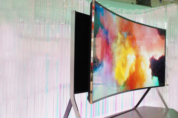 The simple press of a button curves or flattens this 105-inch UHD TV by Samsung.
