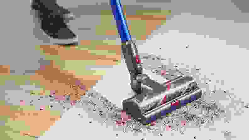 vacuum sucking dirt on carpet