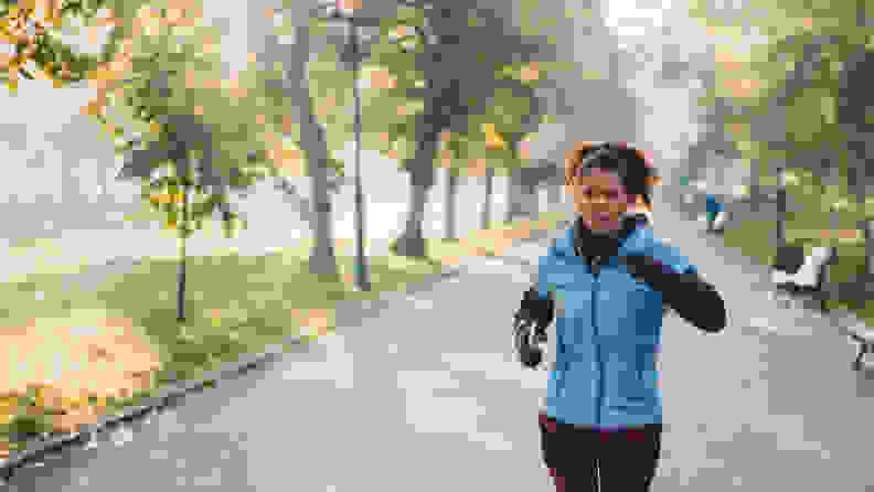 A woman running in the park.