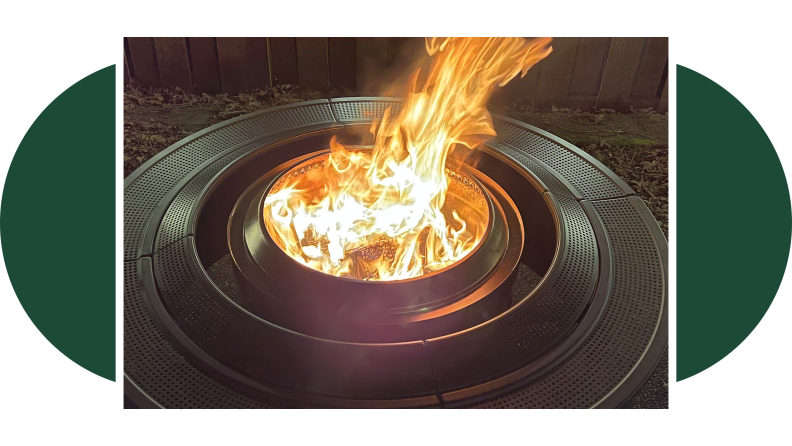 A flame burns bright in the center of the Solo Stove Surround.