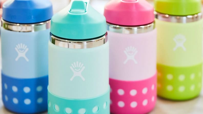 Four of the Hydro Flask Kids 12 ounce bottles in varying colors.