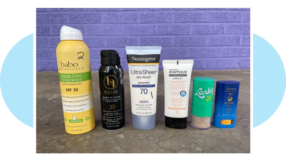 Six different sunscreens next to one another on a blue background.