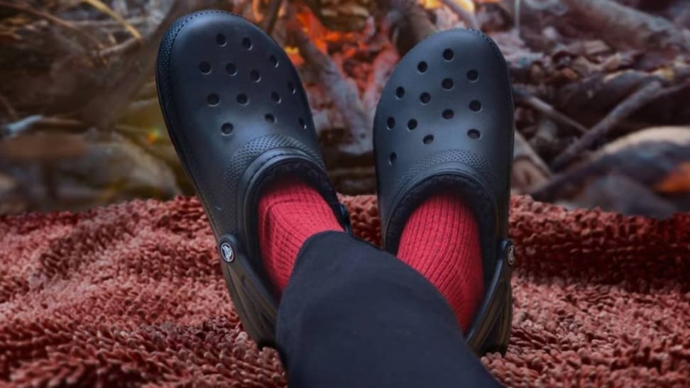 Woman in Crocs on a blanket