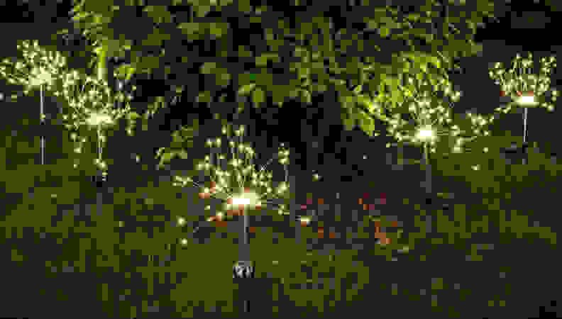 firework shaped twinkling lights in backyard