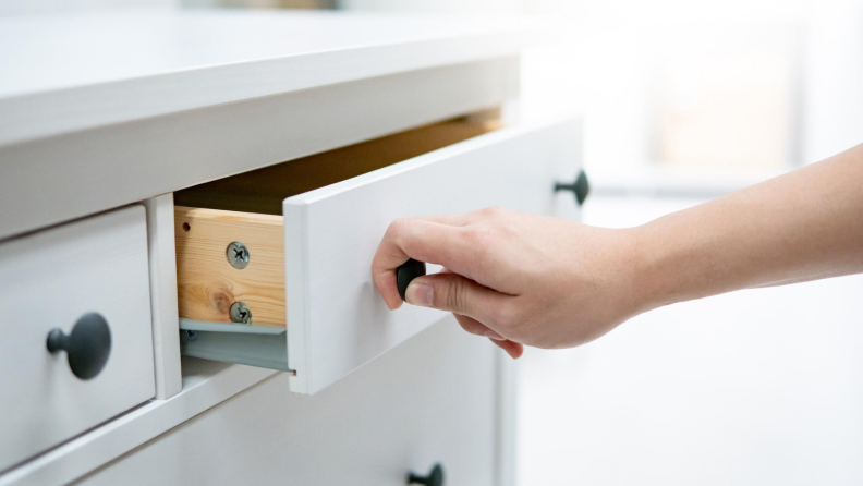 Gray bathroom cabinets with oil rubbed bronze knobs and handles