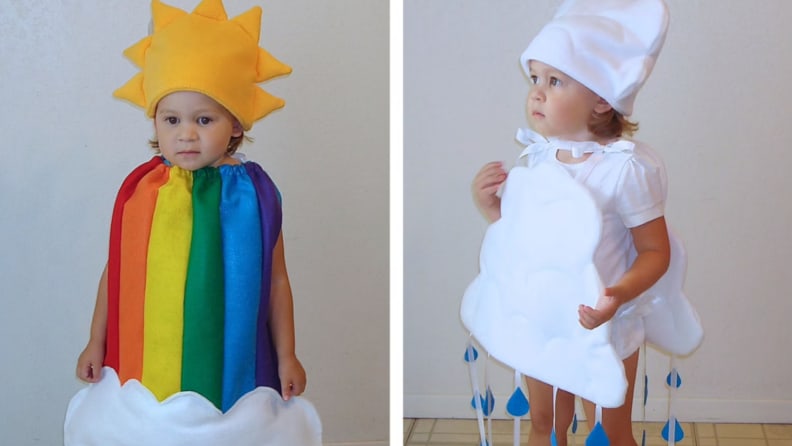 Children dressed in sun, rainbow and cloud Halloween costume.