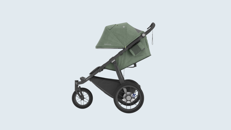 Side view of the Uppababy Ridge Jogging Stroller in green.