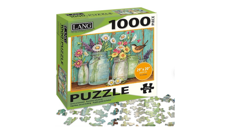 An image of a puzzle. The puzzle features several mason jars full of flowers on a soft blue-green background.