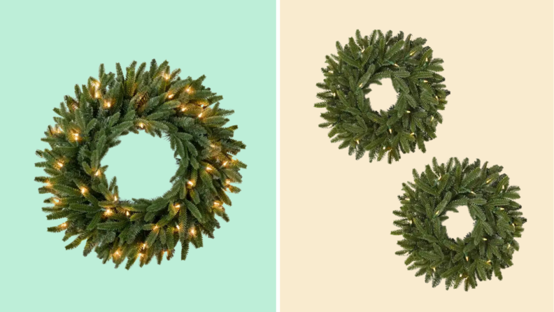A wreath with lights on it against a blue and white background.