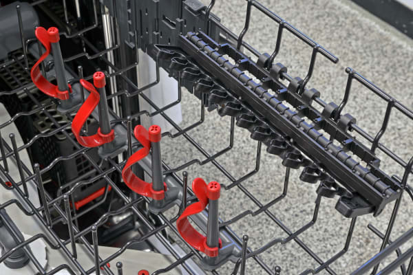 The GE Profile PDT855S's upper rack features four bottle jets, as well as two racks of stemware clips.