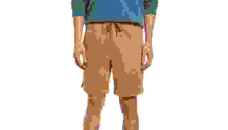 Man wearing blue sweater and tan L.L. Bean shorts.