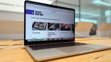 The Apple MacBook Air M4 13-inch laptop on a wooden desk