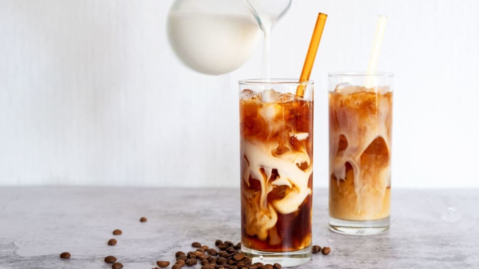 Two glasses filled with ice and cold brew.