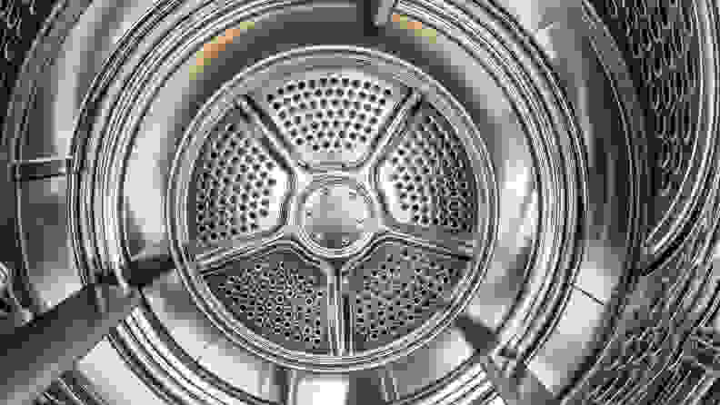 A close-up of the Frigidaire FFRE4120SW dryer's stainless steel drum.