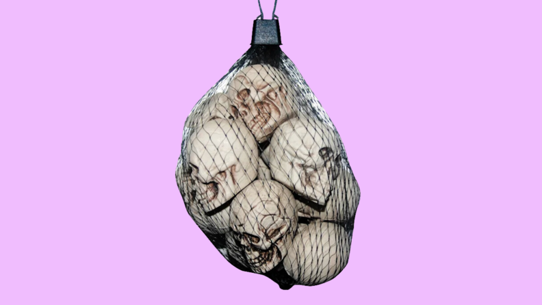 An image of a bag of skulls, grouped together inside a mesh bag.