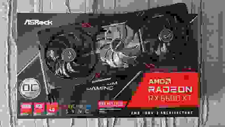 An AMD Radeon RX 6600XT graphics card sitting on top of its product box.