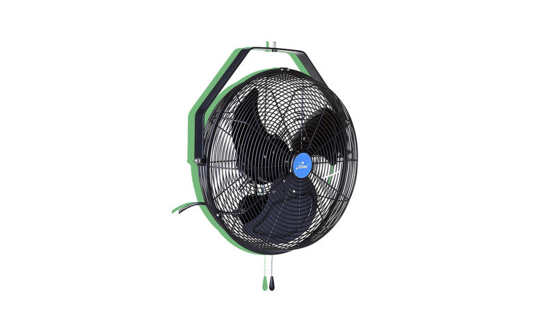 Close up of a rotating fan against a white background.