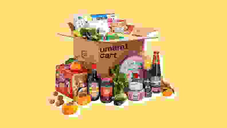 Product shot of assorted Umamicart grocery products inside of box packaging.
