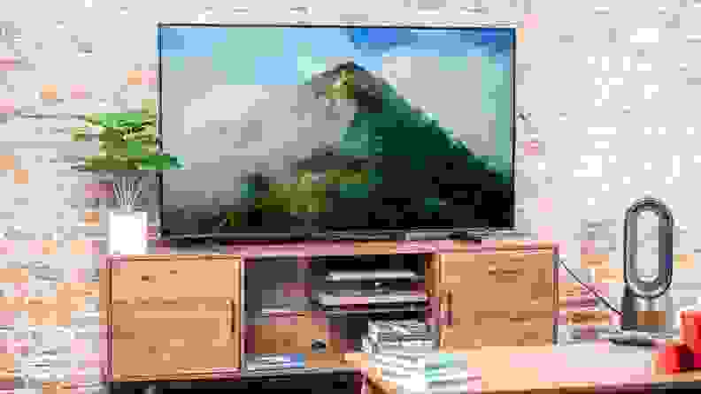 Flatscreen TV featuring a green mountain