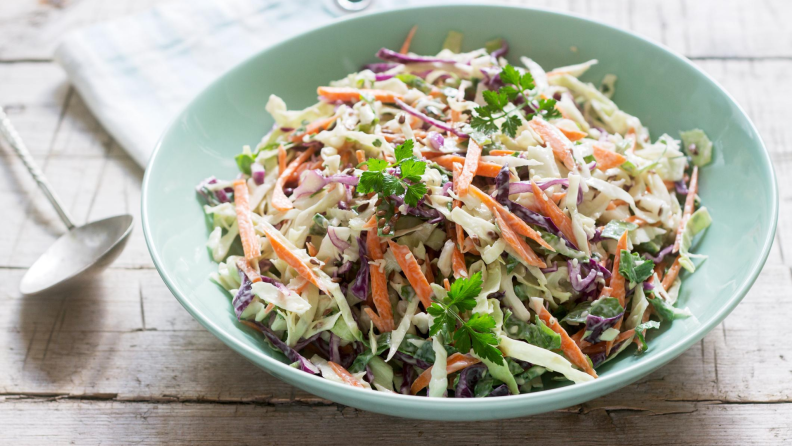 Coleslaw topped with herbs