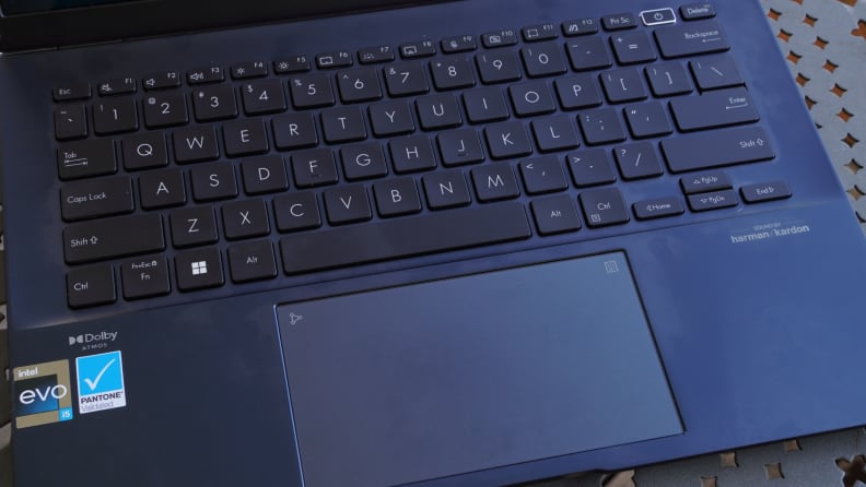 A black keyboard and trackpad on a laptop.