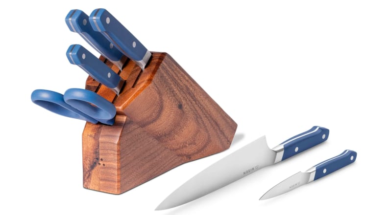 A 7-piece, blue-handled knife set in a wooden storage block