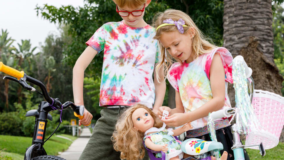 Two kids wearing tie-dye t-shirts