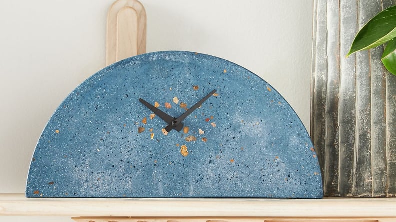 This unique clock is made from concrete and available in two colors.