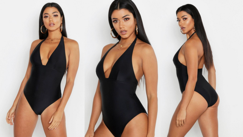Model displaying black one-piece swimsuit.