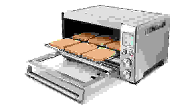 Bread toasting in a toaster oven.