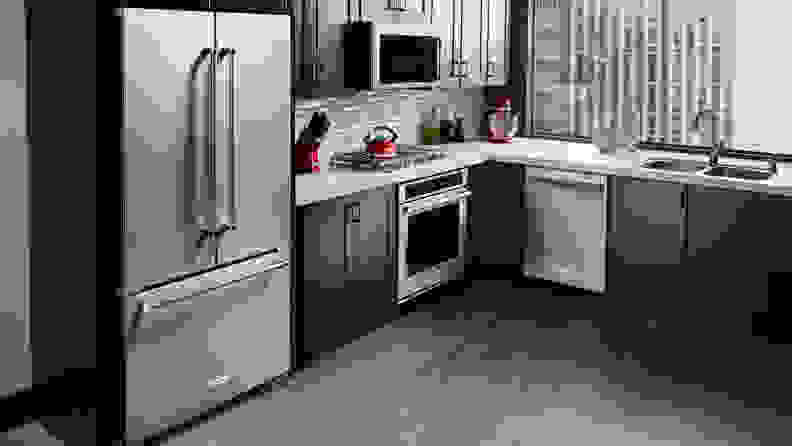 The KitchenAid KRFC300ESS counter-depth fridge, installed in a modern kitchen.